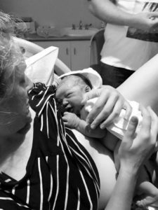 Zaneta meeting her baby girl for the first time as she is brought up to her tummy