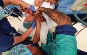 Melissa's caesarean birth cutting the cord