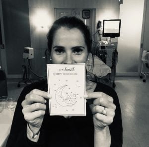 Morgnanholding a positive affirmation card