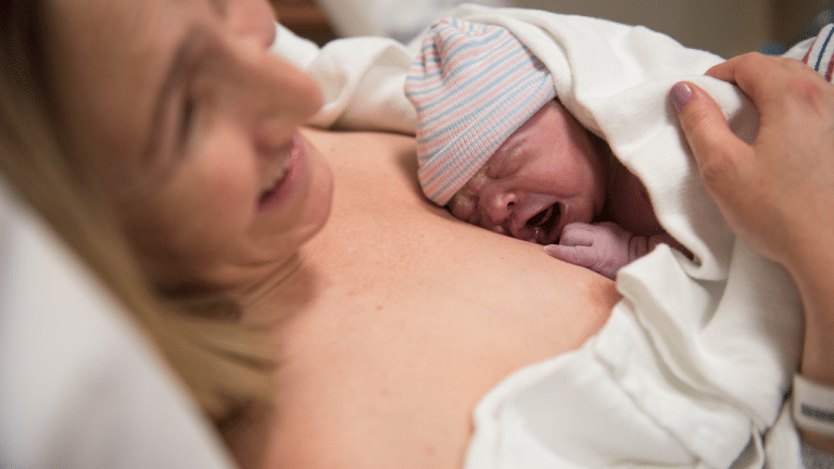 Hypnobirthing mother with newborn baby skin-to-skin