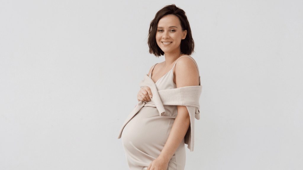 Pregnant mother showing baby bump - Positive Birth Program Value Package product image